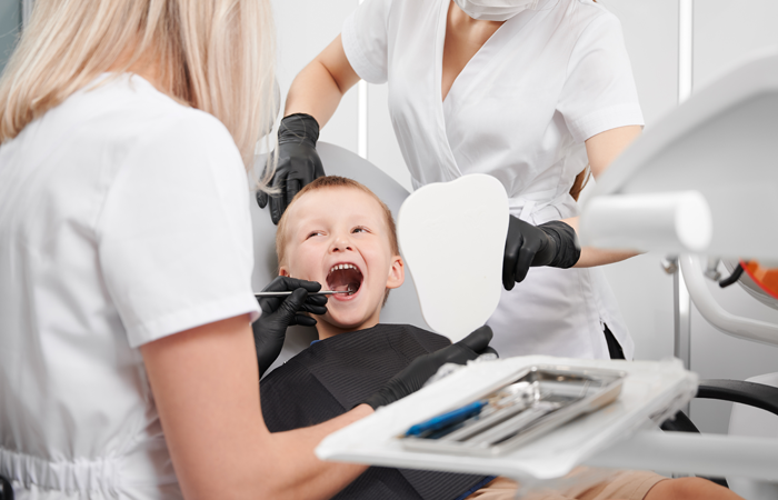 happy child receiving dental exam